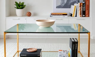 Glass top coffee table with metal base
