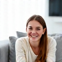 Sarah J. sitting on her new Modern Furniture Design sofa